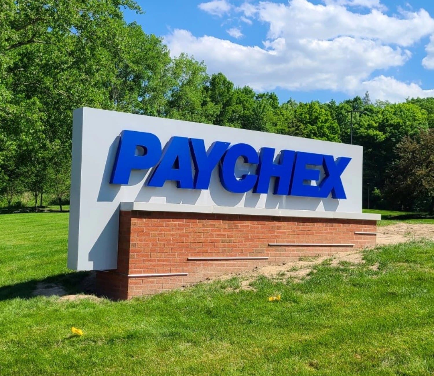 Paychex monument sign on a brick base